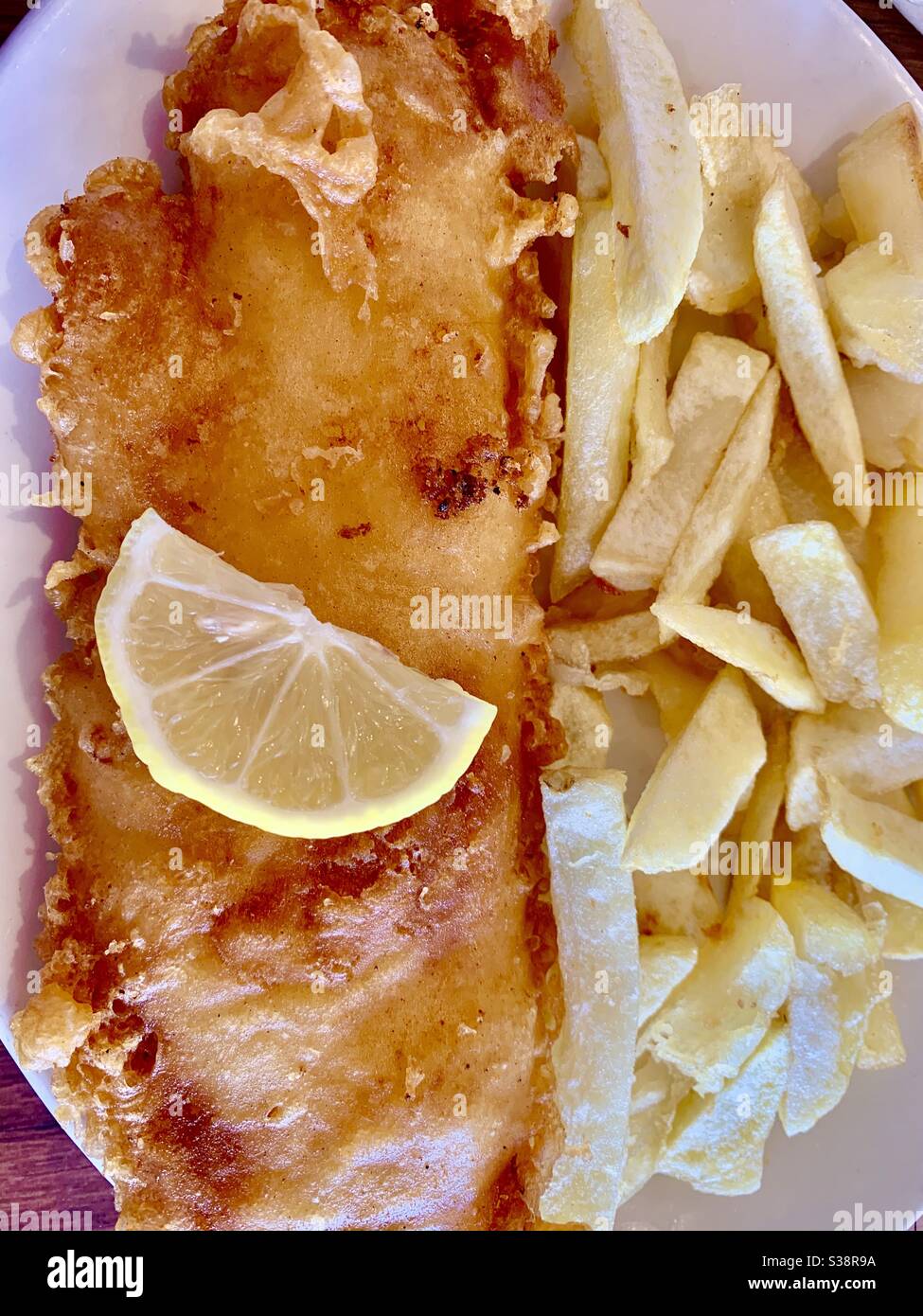 Traditional British Fish and Chips, at Whitby beach UK. Stock Photo