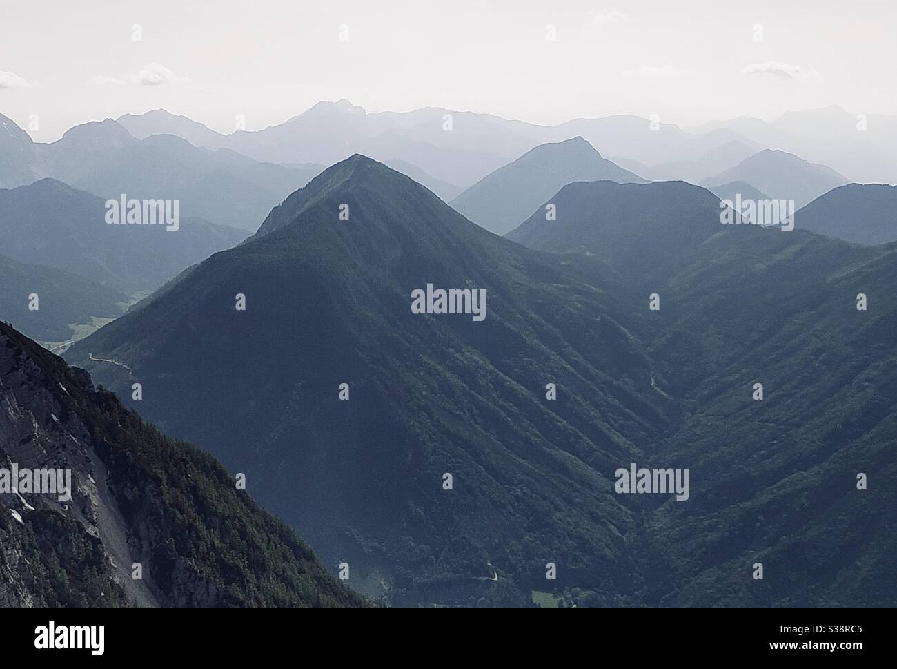 A view of Alps mountain range in Austria from Hochobir summit near Klagenfurt - Smartphone Captured Stock Image