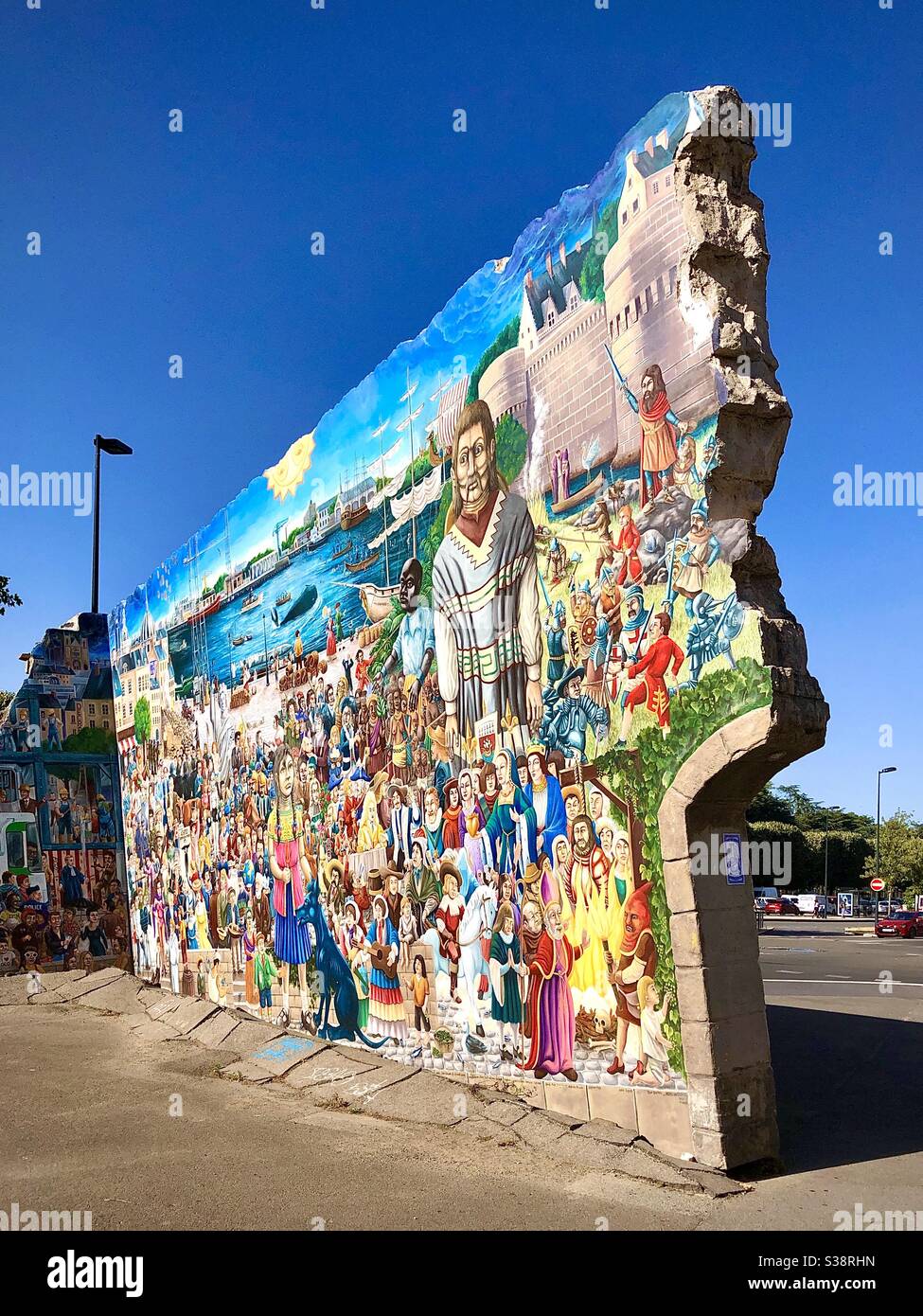 The restored “La Fresque des Géants” street art depicting more than 200 notable people in the Madeleine, Nantes, Loire-Atlantique, France. Stock Photo