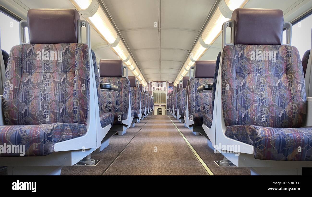 LOS ANGELES, CA, JUN 2020: low angle view of interior empty Metrolink train car, light rail system used by commuters in Southern California - Smartphone Captured Stock Image