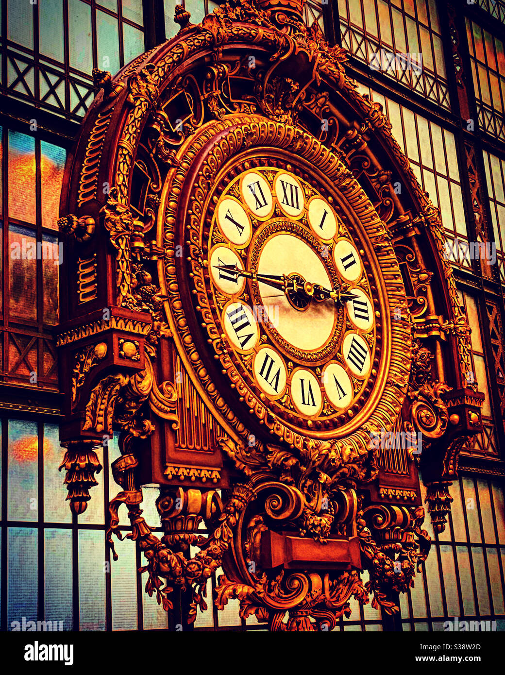 Giant old style vintage look public clock in gold color Stock Photo