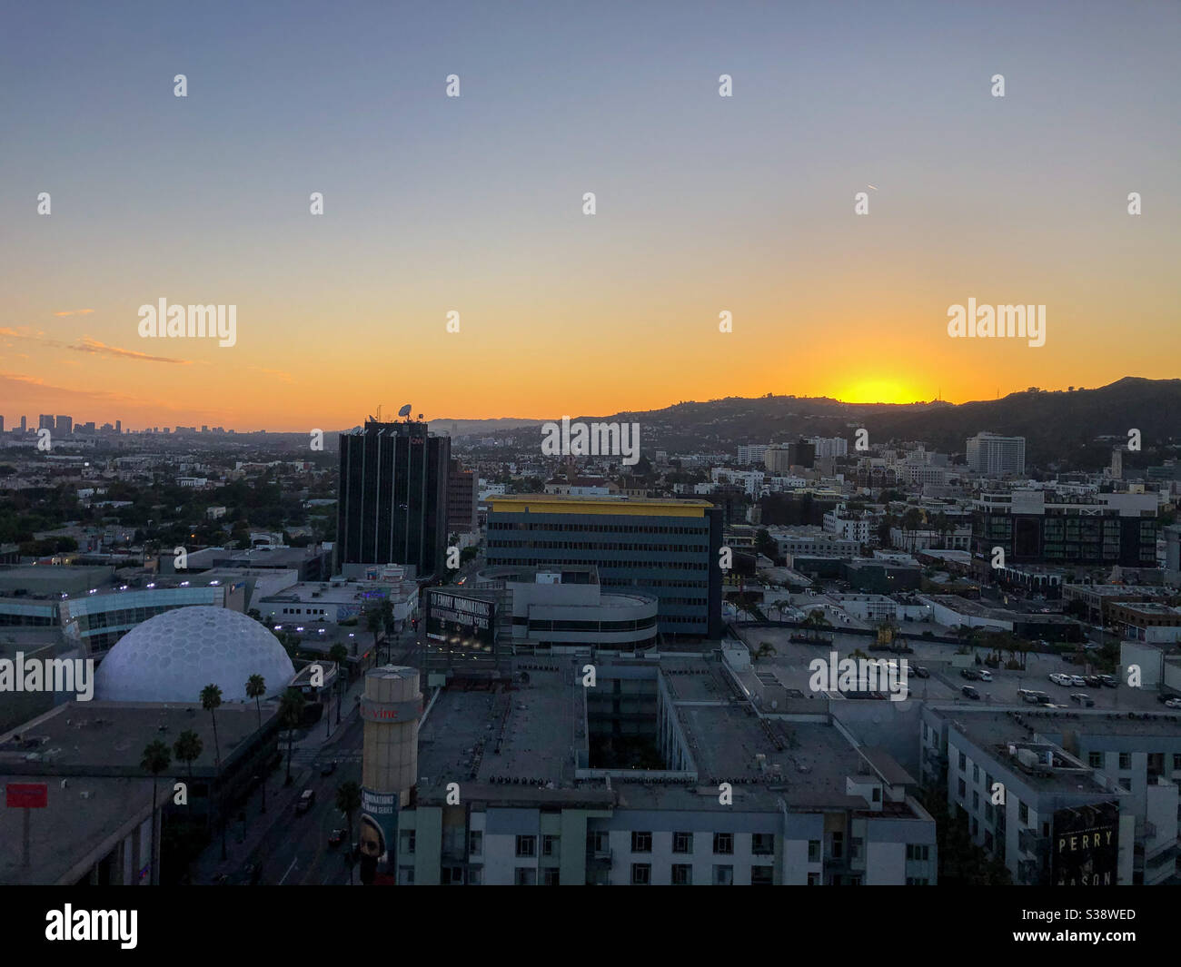 Sunset over city Stock Photo