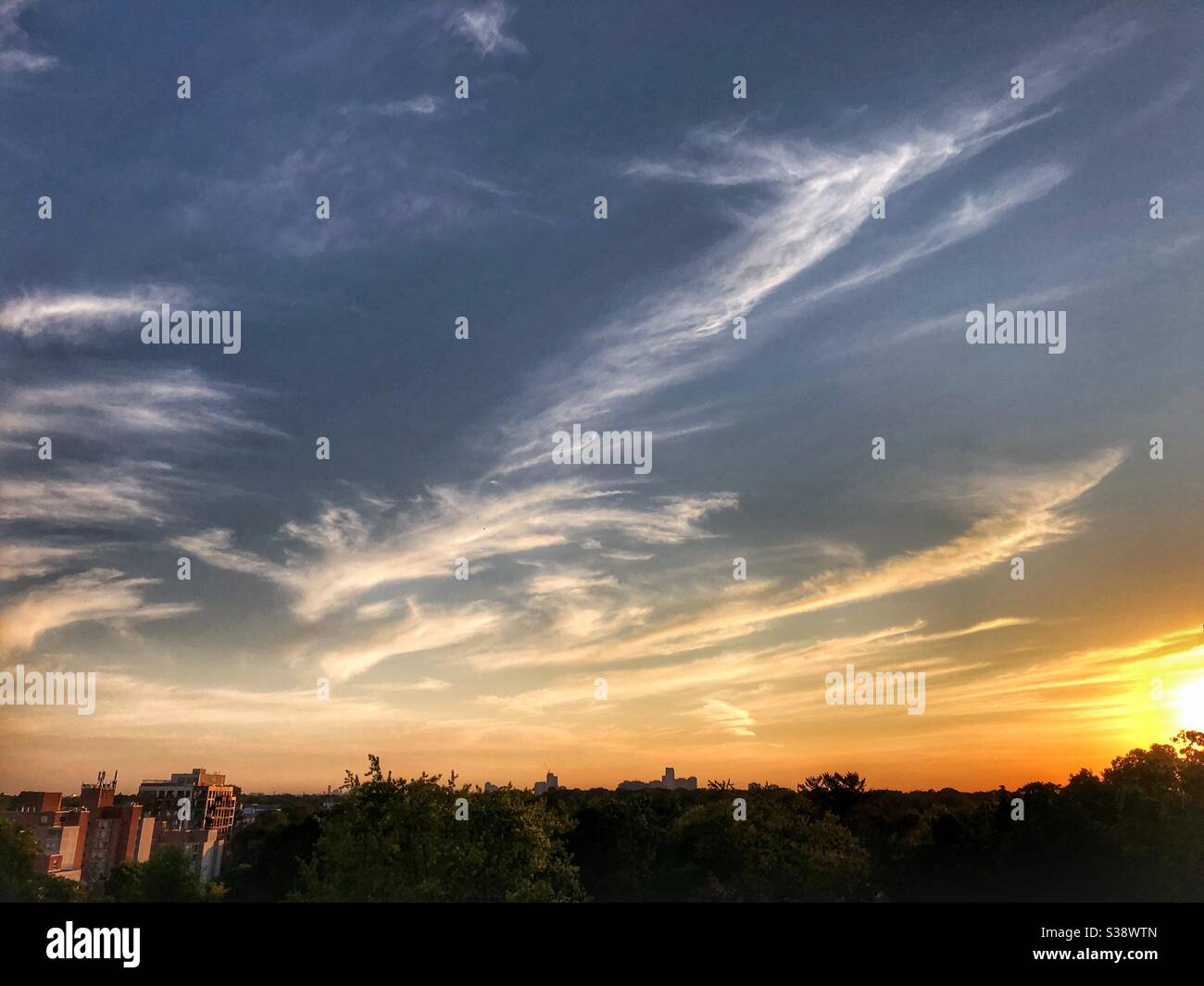 Angelic evening sky as the sun sets. Stock Photo