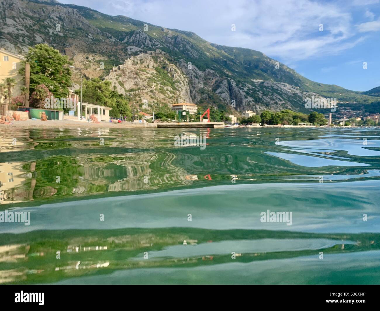 View from swimming off the coast in montenegro - Smartphone Captured Stock Image