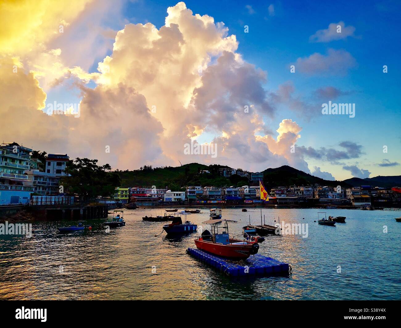 The village of Yung Shue Wan after sunrise Stock Photo Alamy