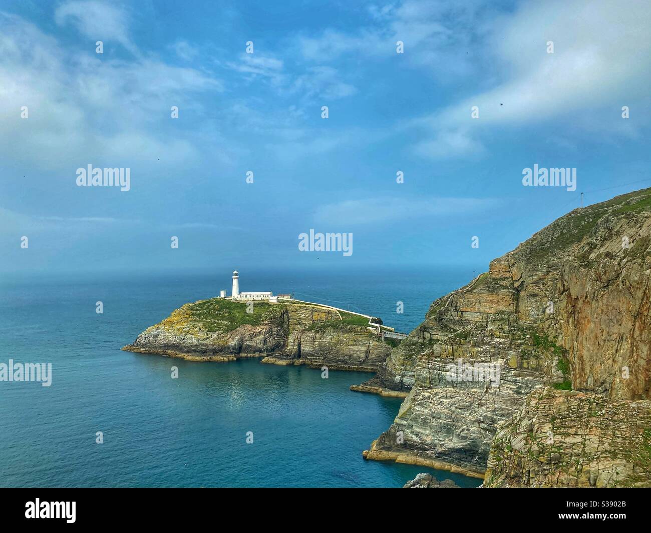 Landscape composition of south stack lighthouse, Holyhead, Anglesey, north wales, text space above - Smartphone Captured Stock Image