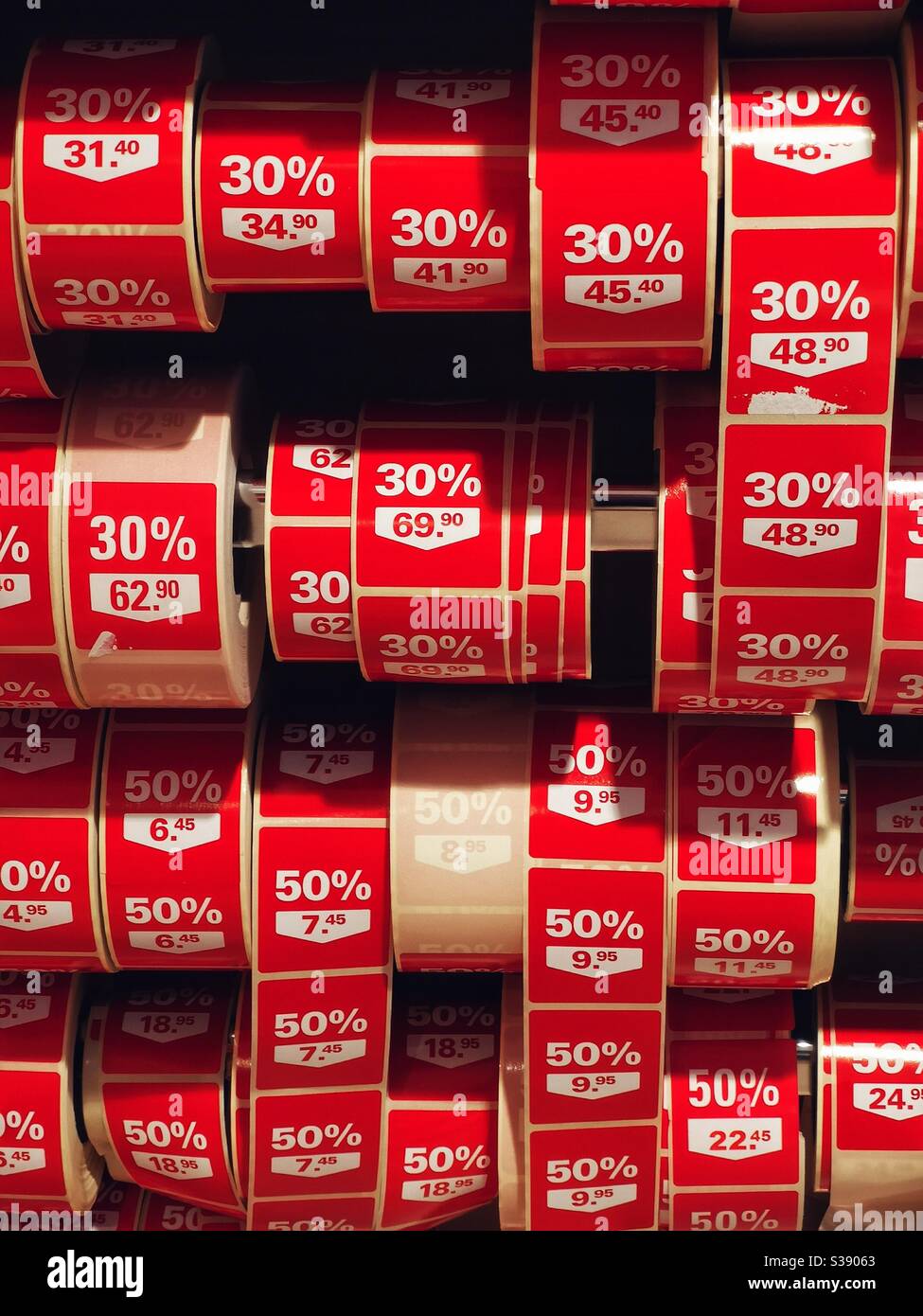 Price reduction labels in Swiss store - Smartphone Captured Stock Image