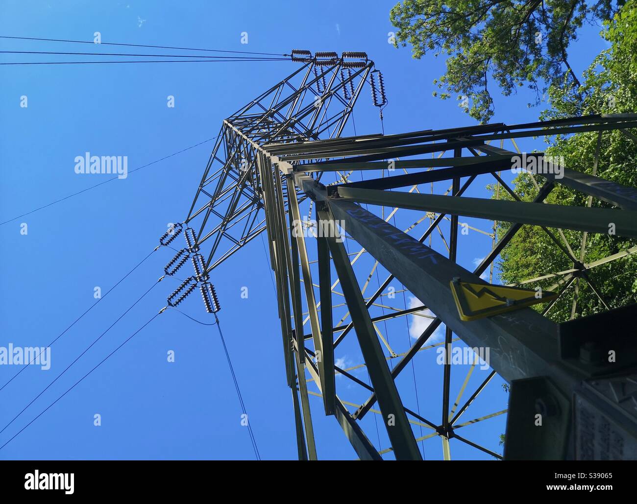 Electricity pylon against blue sky - Smartphone Captured Stock Image