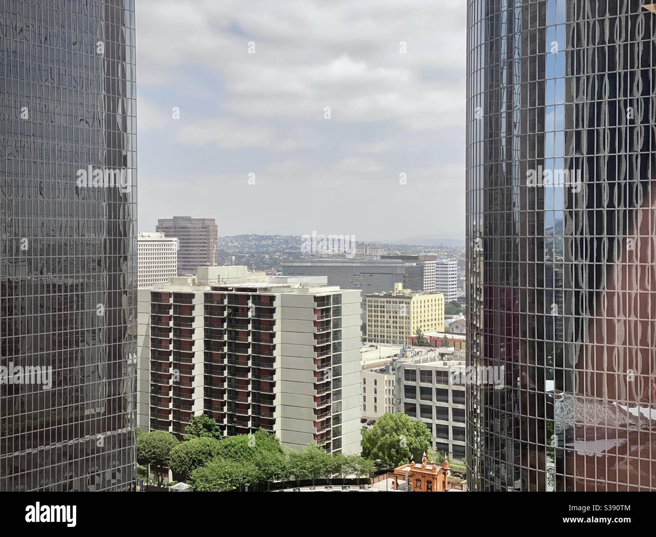 LOS ANGELES, CA, JUN 2020: view looking east, framed by skyscrapers at California Plaza in Downtown - Smartphone Captured Stock Image