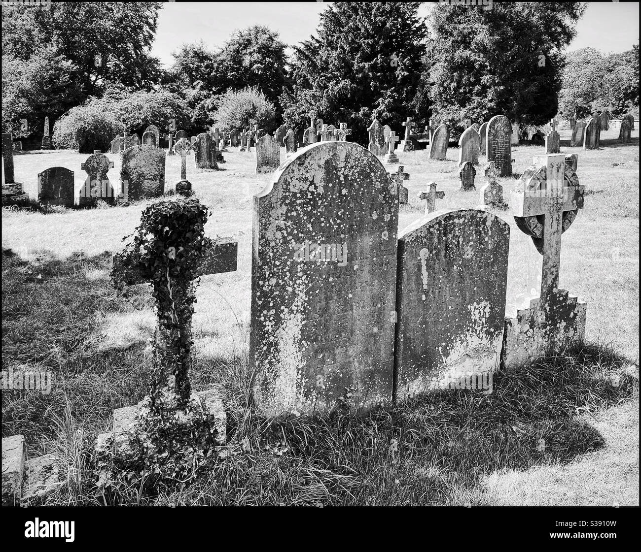 An old graveyard somewhere in Europe. The use of high contrast monochrome adds to the interest of this image. Photo Credit - ©️ COLIN HOSKINS. - Smartphone Captured Stock Image