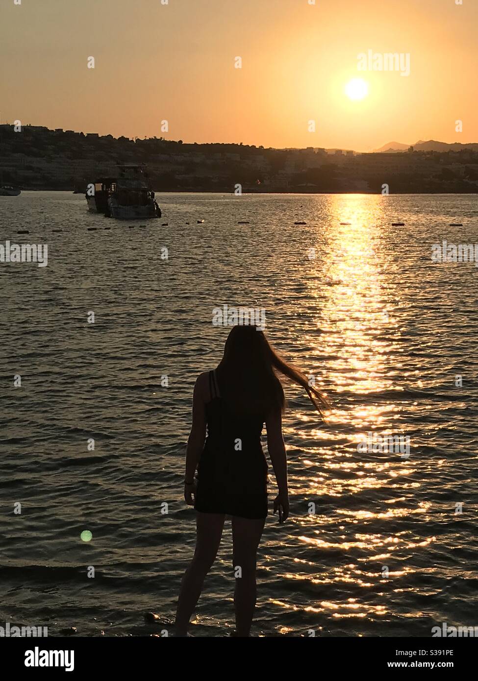 Boats water sunset red hi-res stock photography and images - Alamy