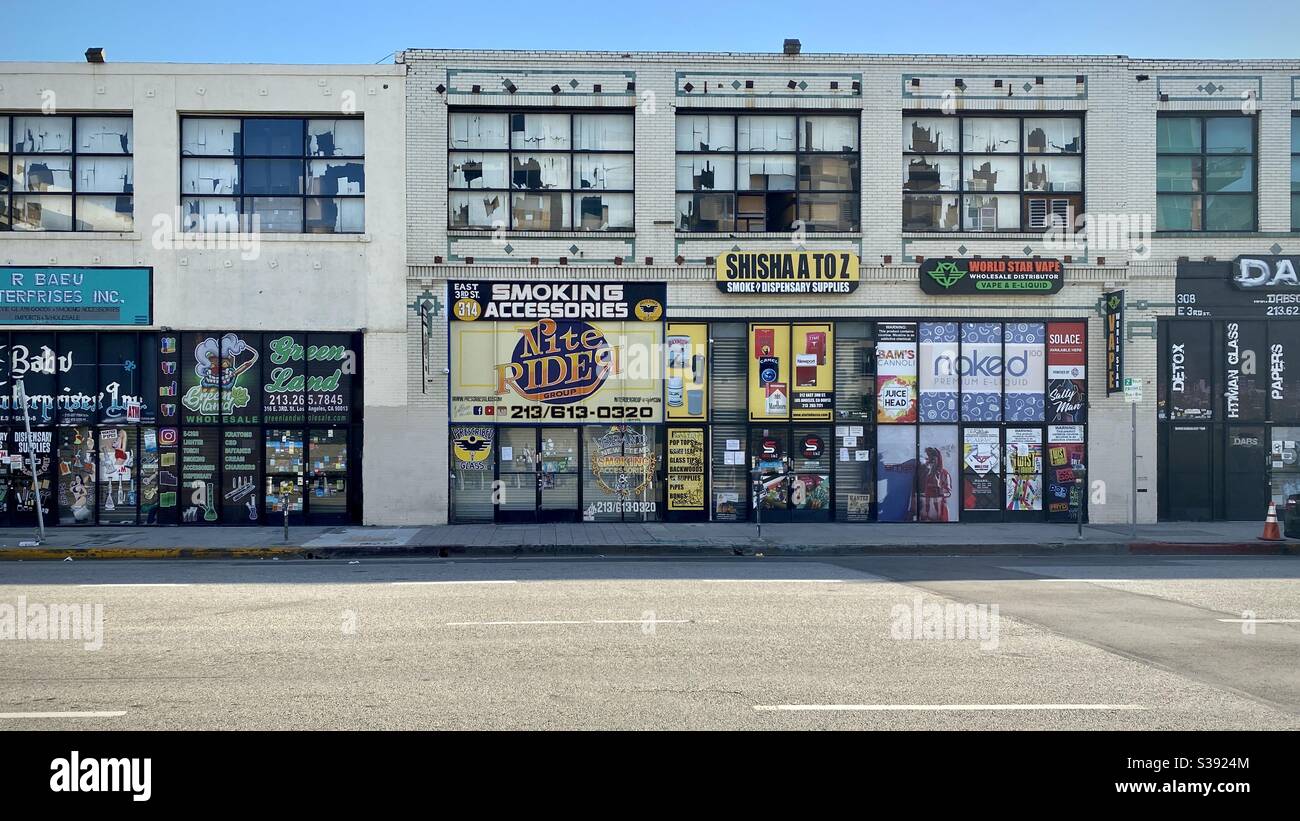 LOS ANGELES, CA, JUN 2020: various smoking supply shops and cannabis dispensaries in Downtown - Smartphone Captured Stock Image