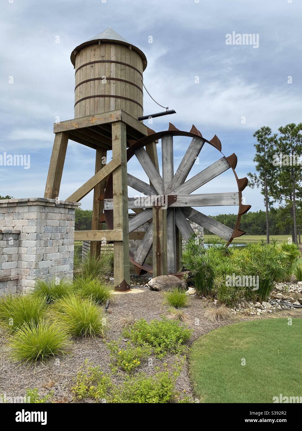 Water tank fountain feature at an outdoor park Stock Photo Alamy