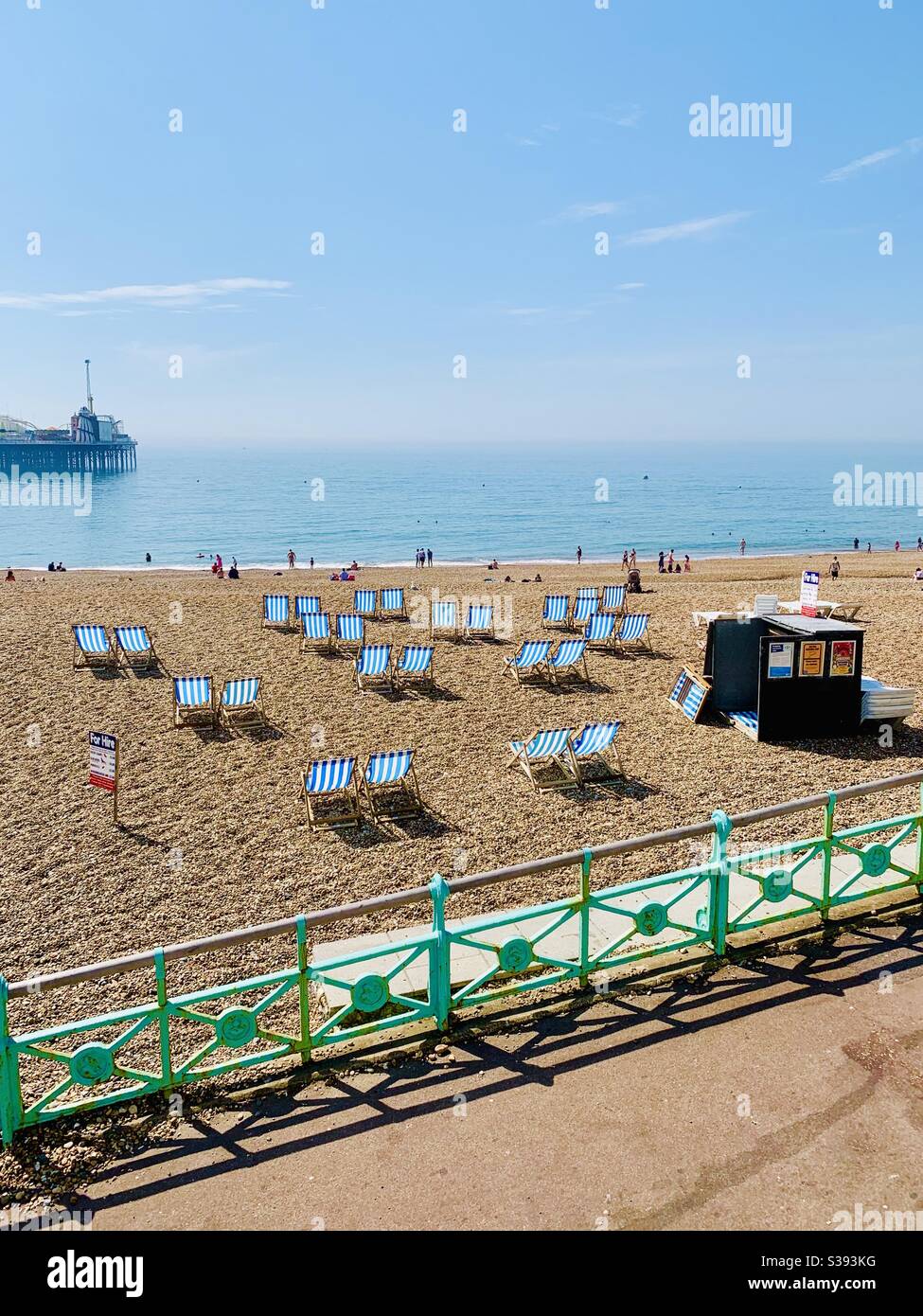 Brighton, UK - 12 August 2020: Deck chairs on the beach waiting for customers. - Smartphone Captured Stock Image