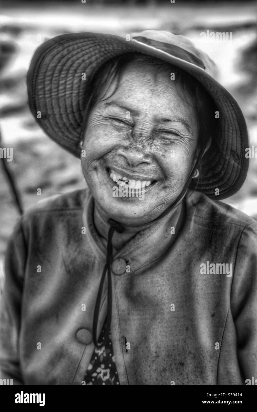 Smile of the woman of the seaside Stock Photo