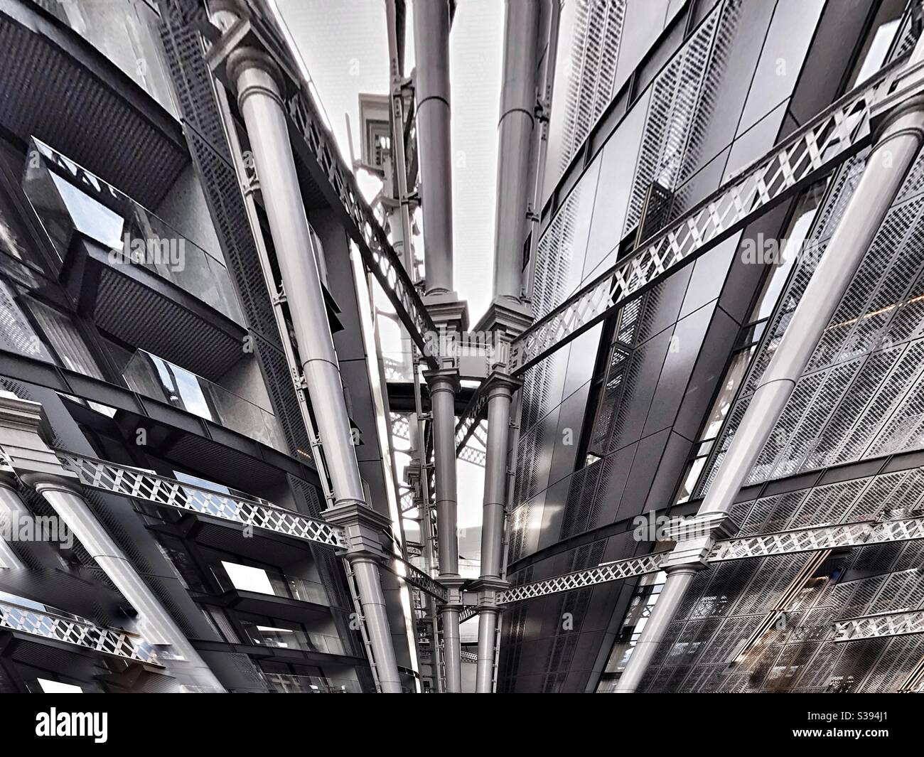 Creative view of cylindrical steelwork around flats and buildings Stock Photo