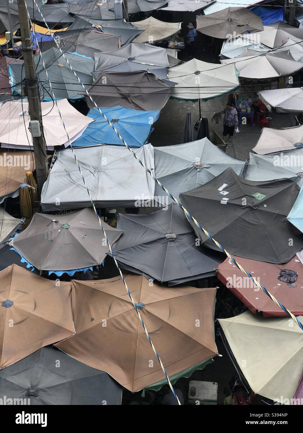 Umbrellas in a traditional market. Stock Photo