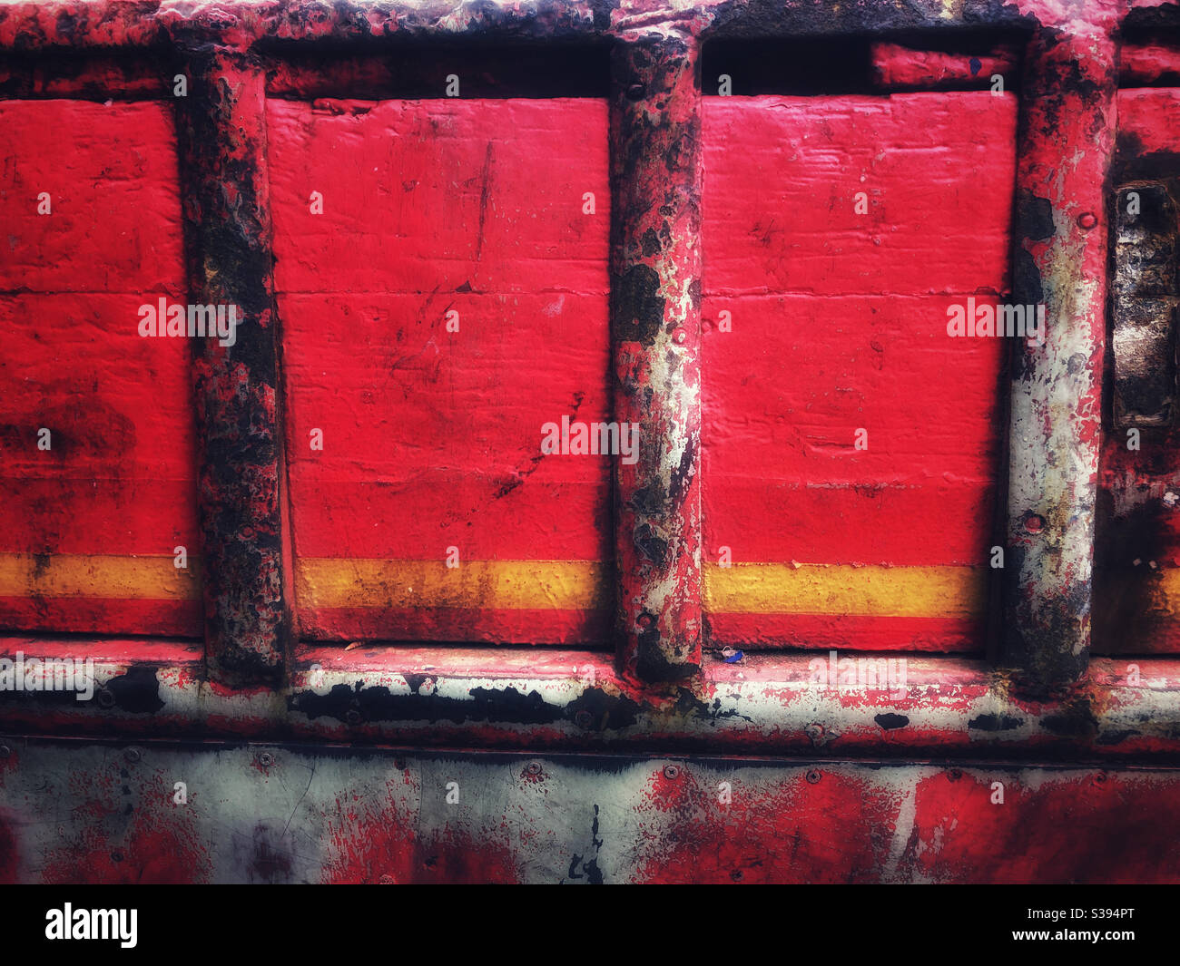 The side of an old trawler painted red - Smartphone Captured Stock Image