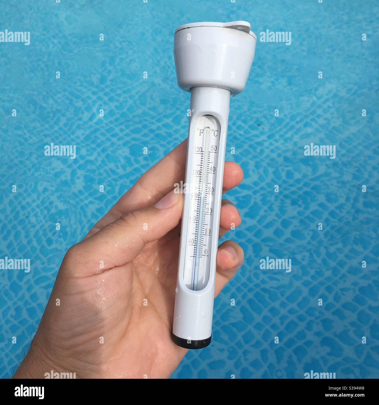 Pool thermometer reading 31 degrees Stock Photo