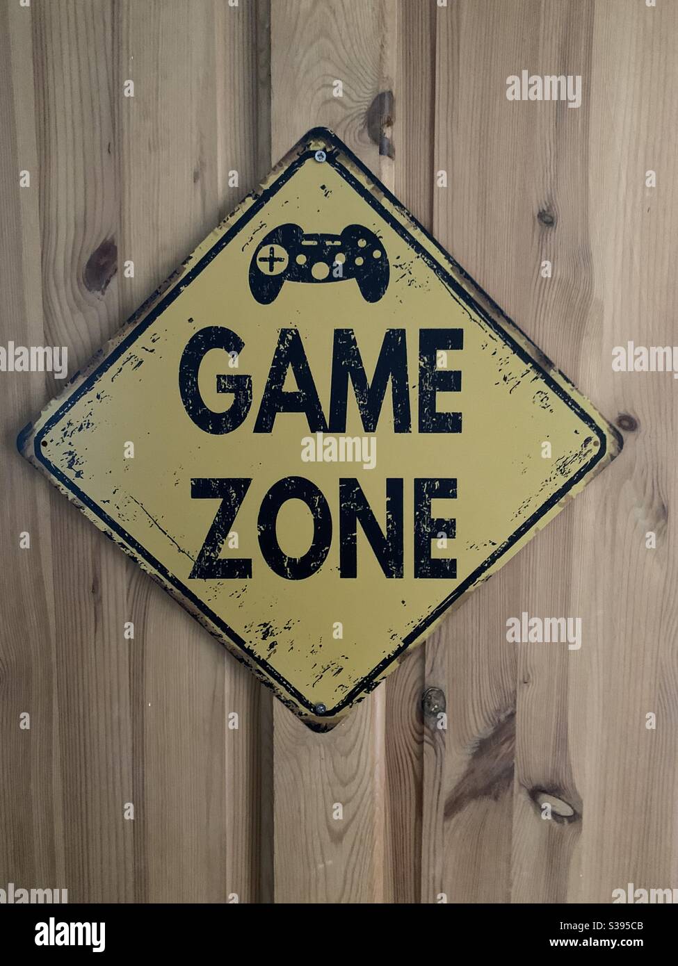 Game zone sign a child’s bedroom door Stock Photo