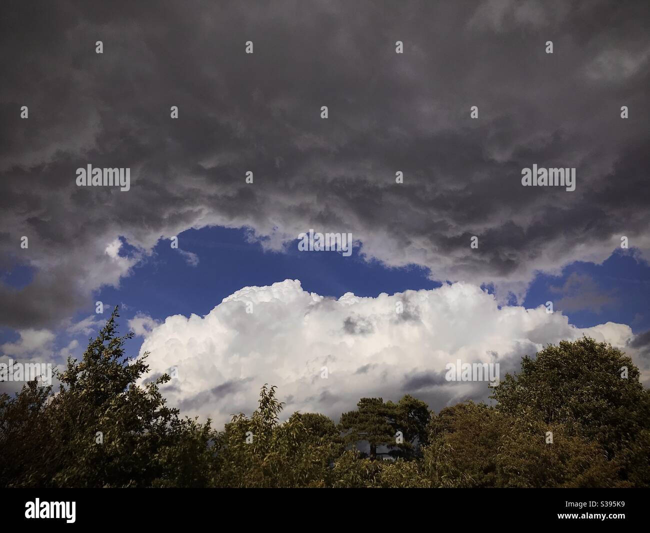 A rather dramatic sky on an August day Stock Photo