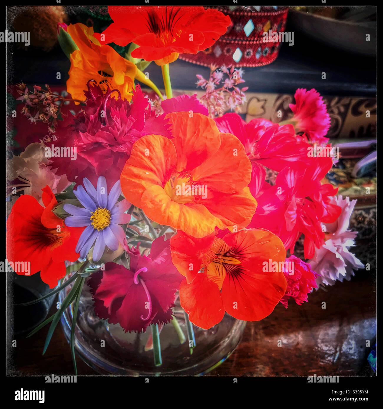 Small bouquet of garden flowers on table. - Smartphone Captured Stock Image