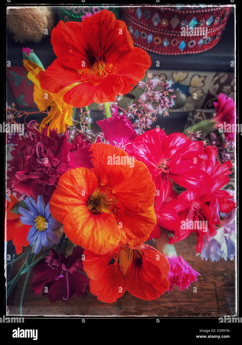 Small bouquet of garden flowers on table. - Smartphone Captured Stock Image