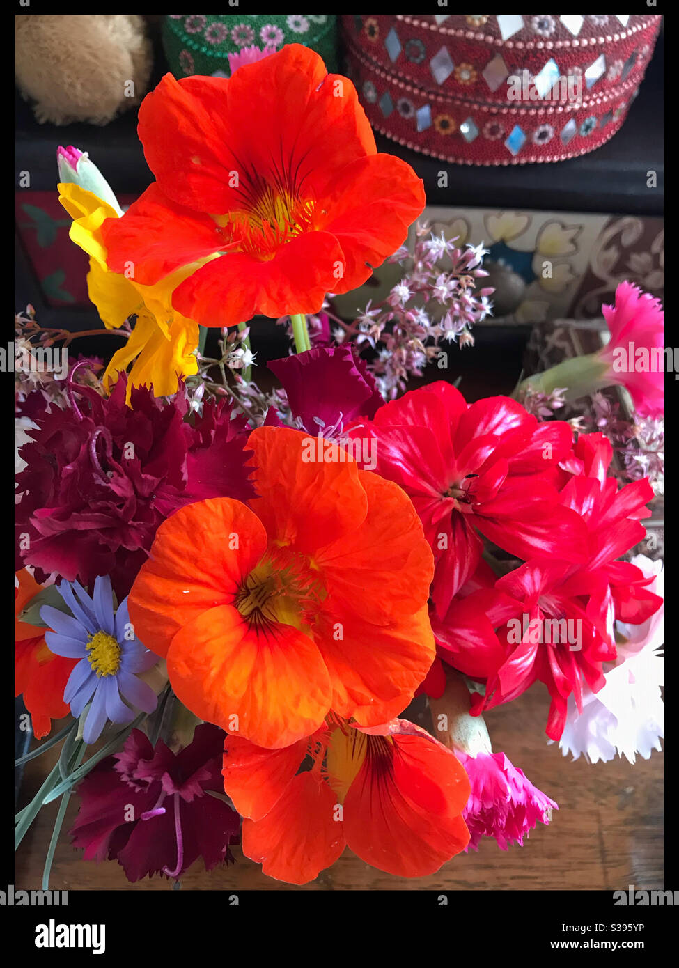 Small bouquet of garden flowers on table. - Smartphone Captured Stock Image