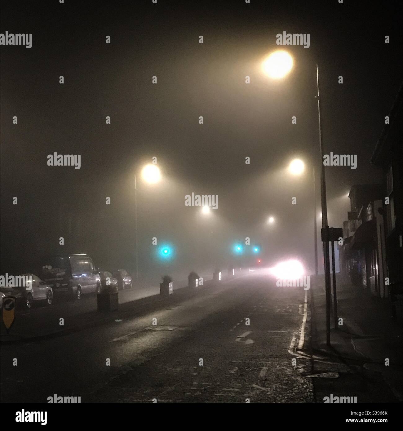A foggy street at night - Smartphone Captured Stock Image