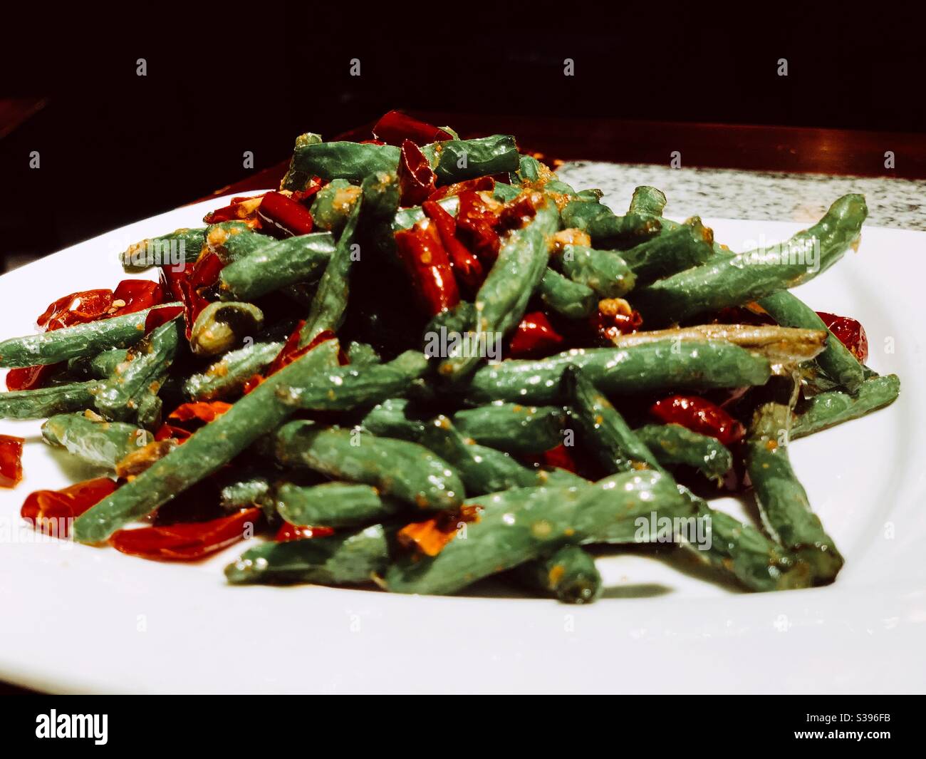 Stirred fried green beans Stock Photo