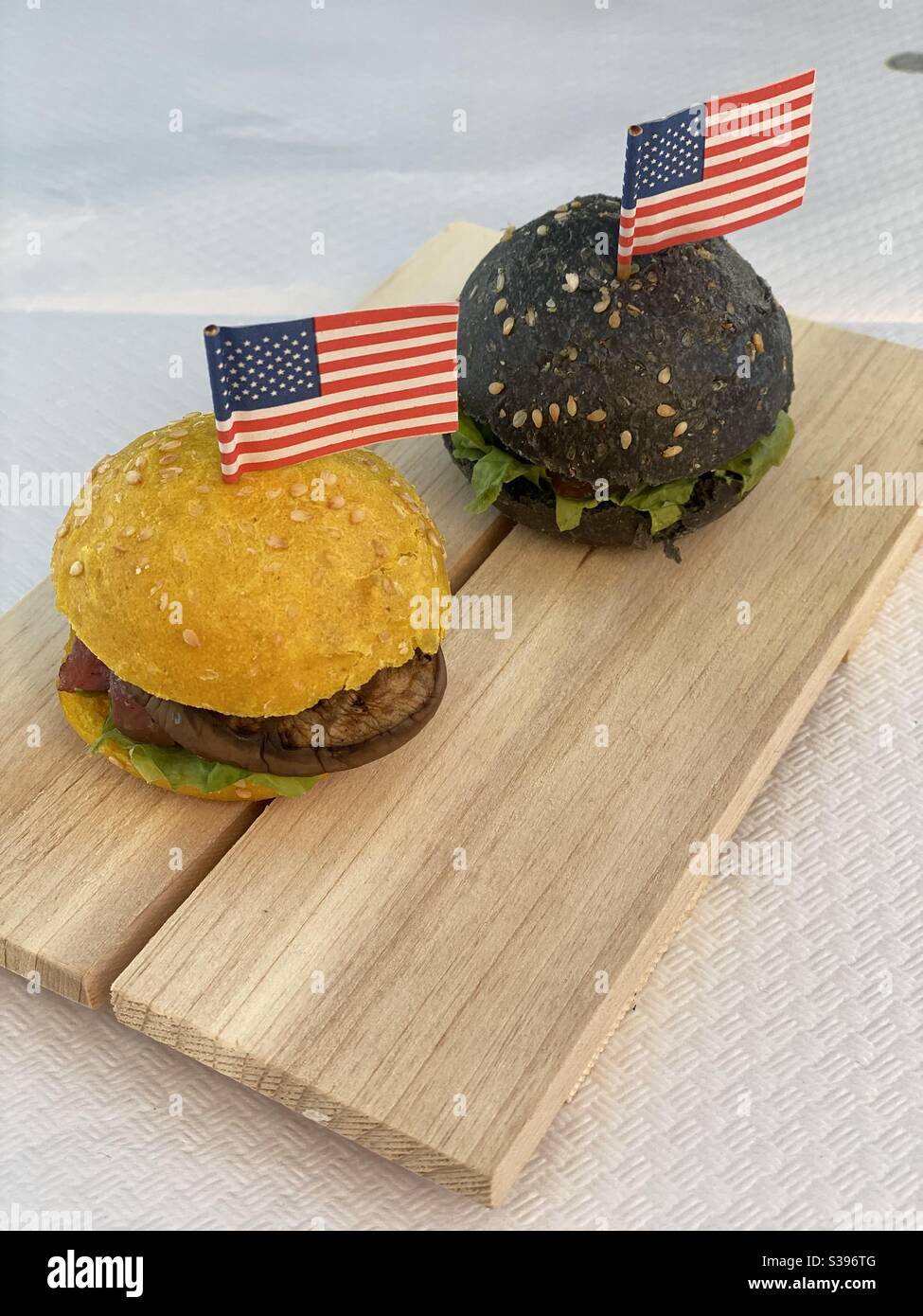 Two sandwiches with saffron and cuttlefish ink with american flag - Smartphone Captured Stock Image
