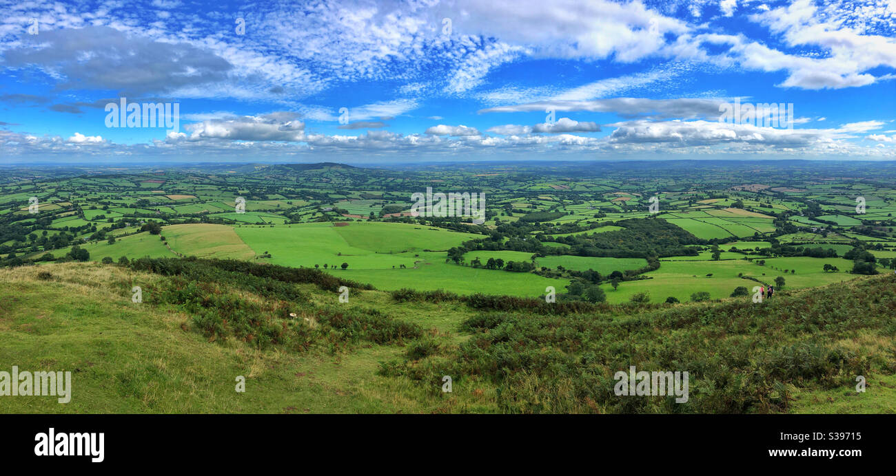 Rolling panoramic countryside view over Monmouthshire from the top of the Skirrid (Ysgyryd Fawr), August. - Smartphone Captured Stock Image