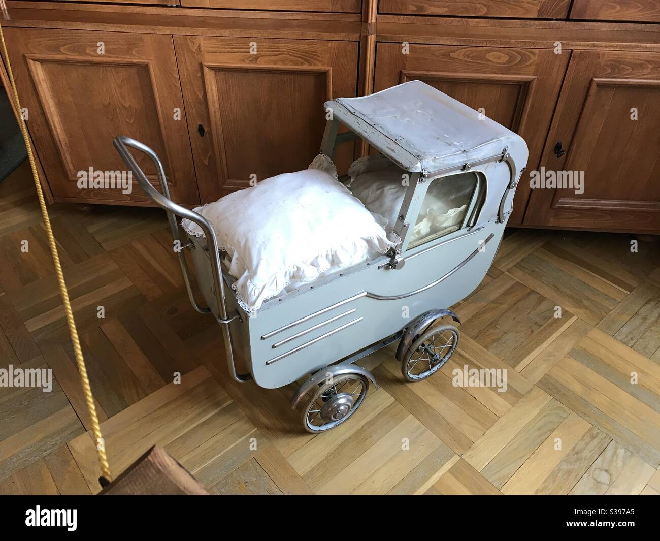 Pram with Car Elements Stock Photo