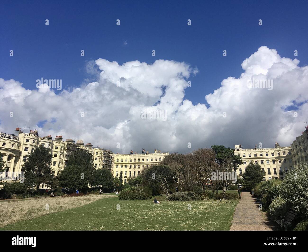 Brunswick Square, Hove, England, a splendid garden square and public park with mature landscaping, surrounded by impressive Regency architecture - Smartphone Captured Stock Image