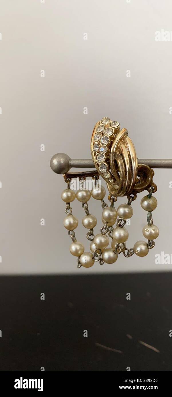 Vintage Gold Chain Clip on Earrings that have a looping dangling chain