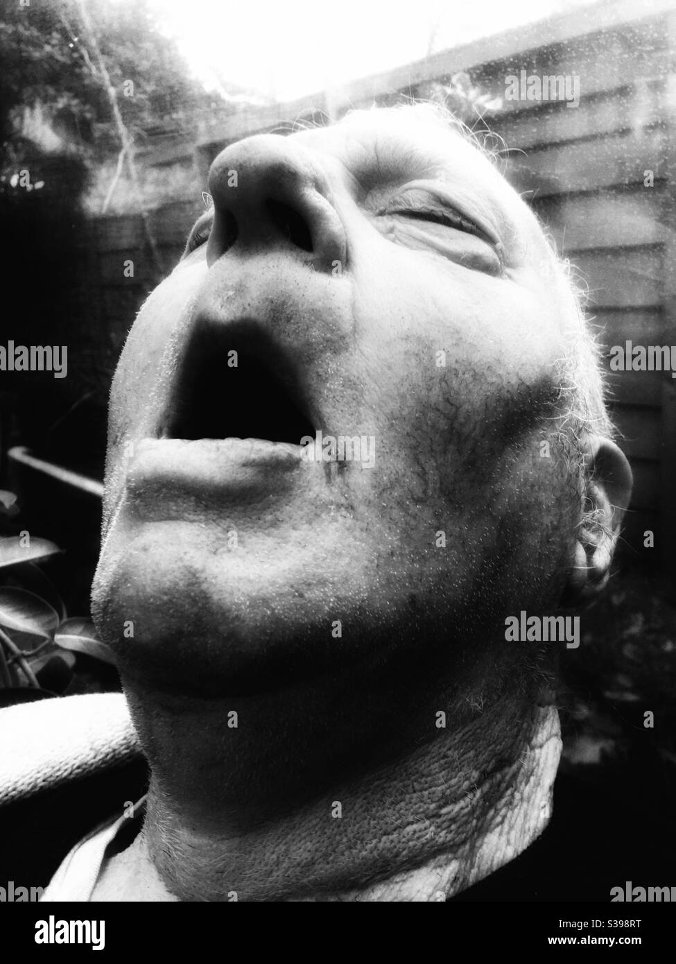 Elderly man asleep - Smartphone Captured Stock Image