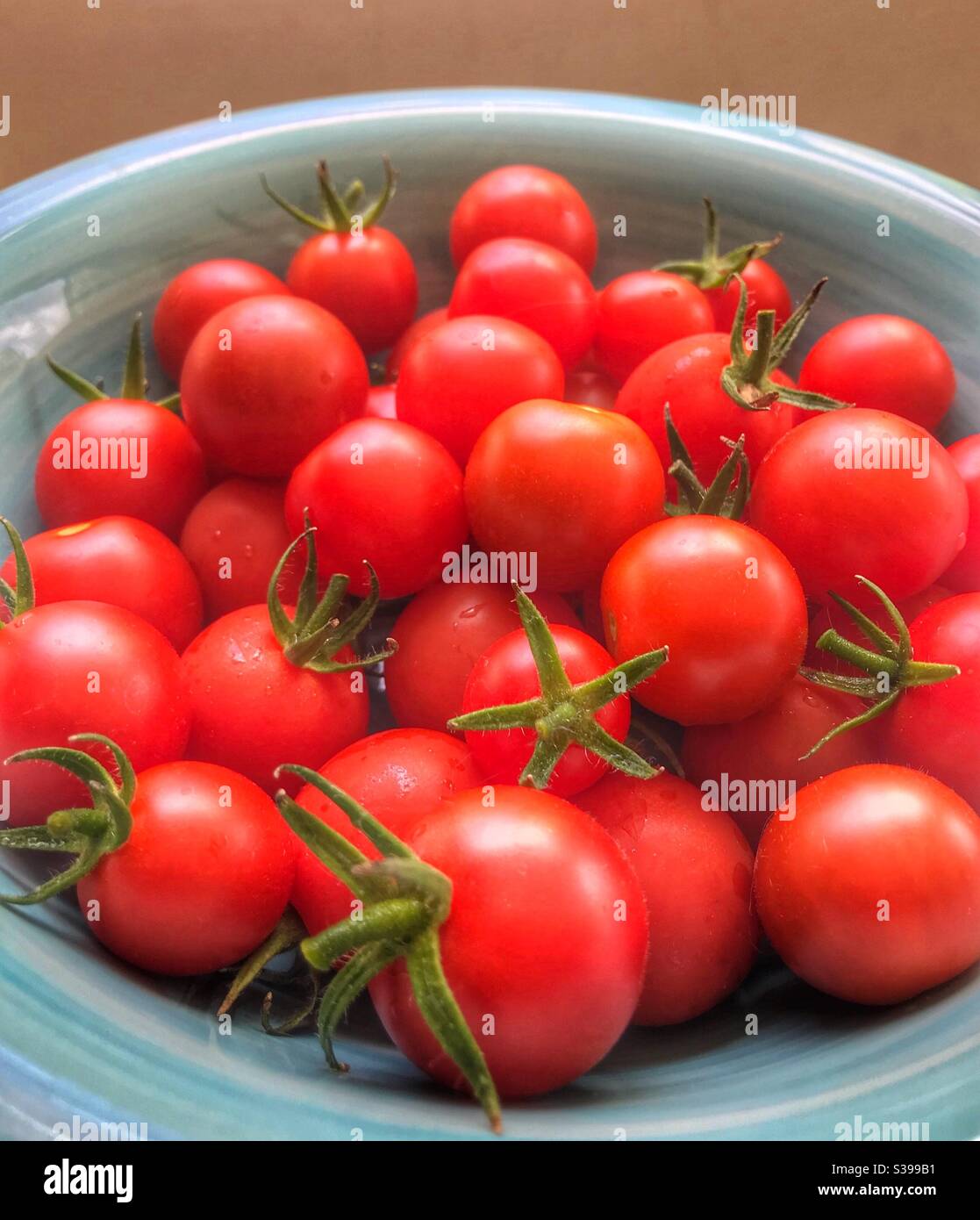 Cherry tomatoes in a bowl Stock Photo