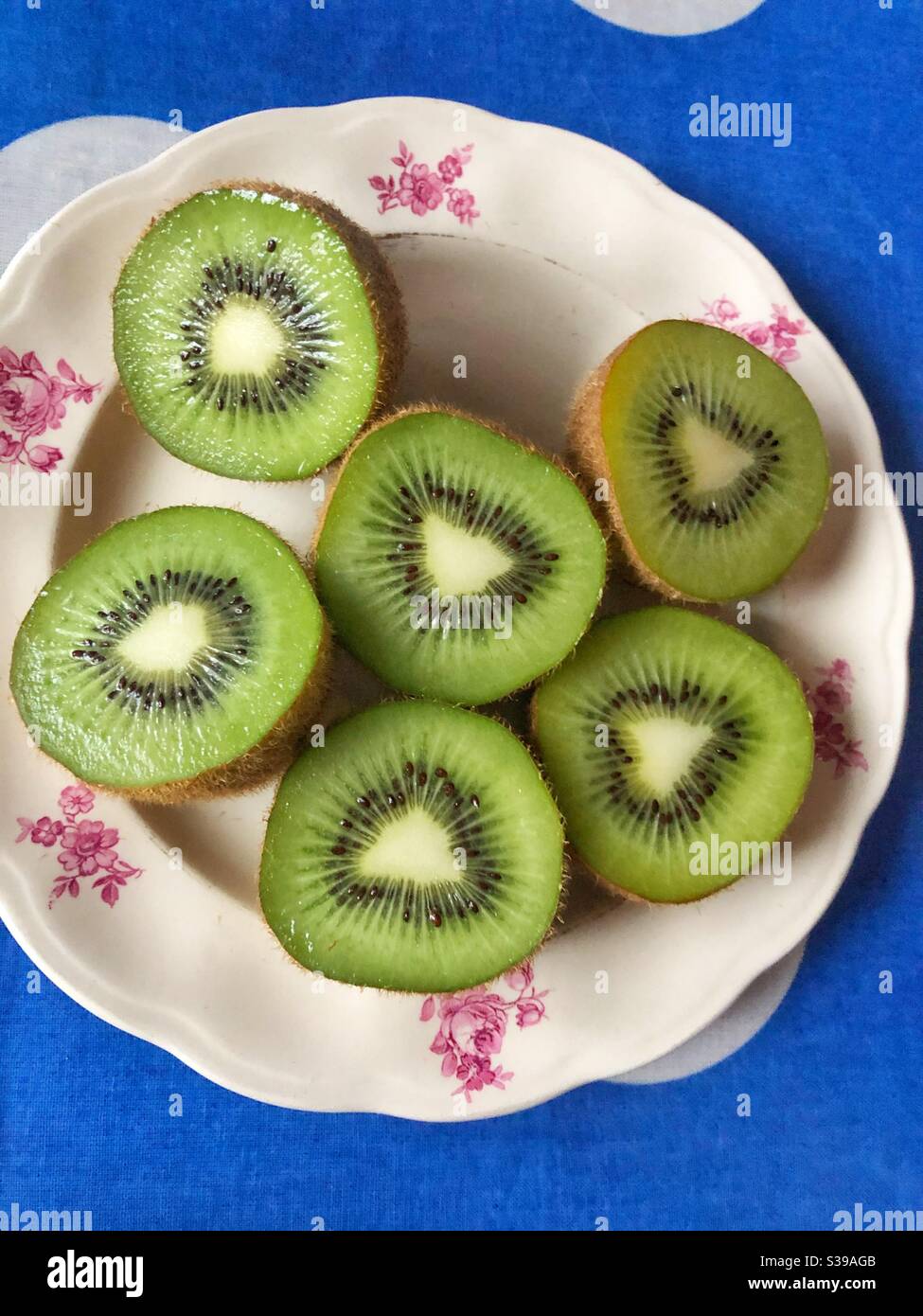 Kiwi fruits on plat Stock Photo Alamy