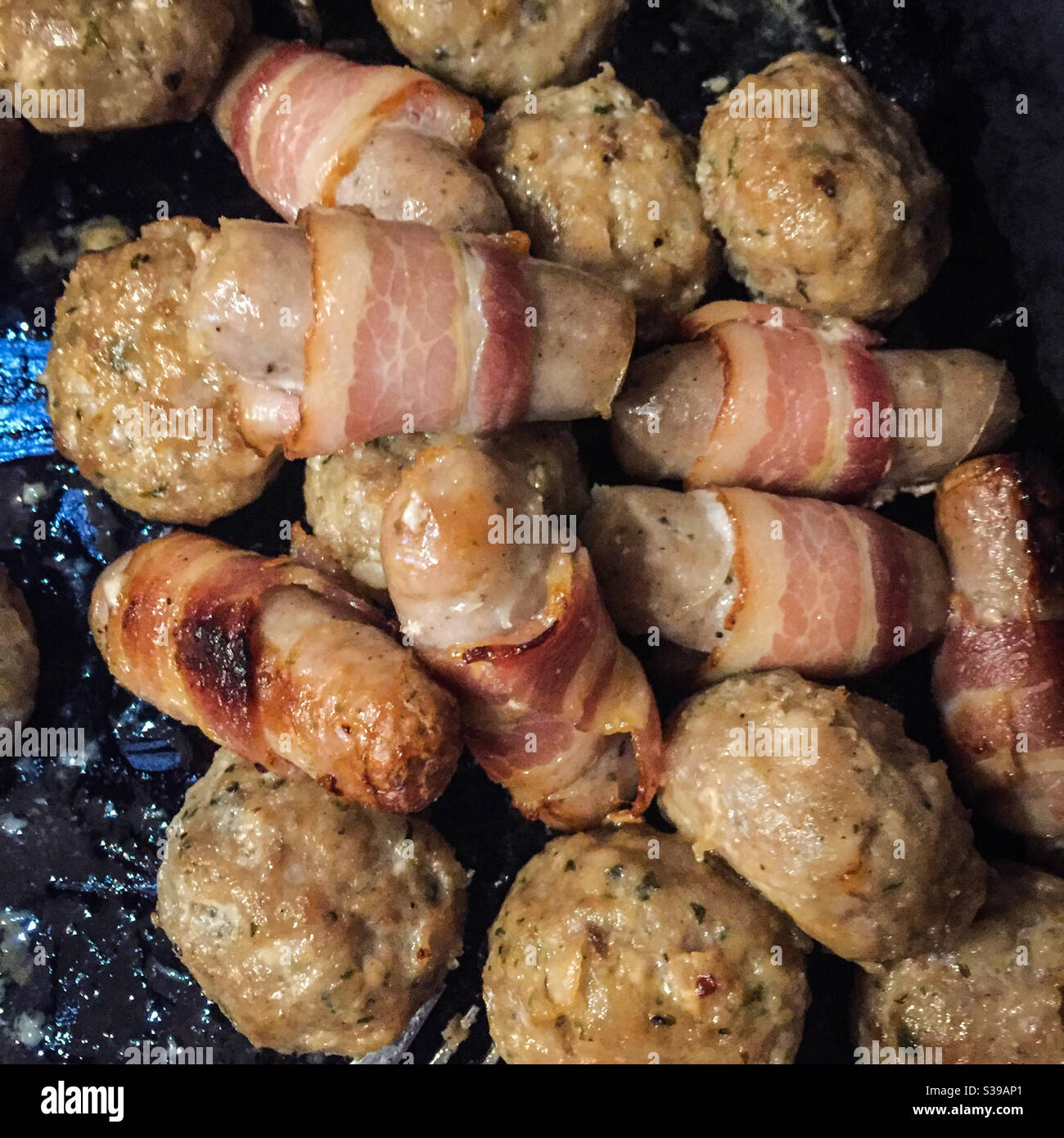 Pigs in blankets with stuffing Stock Photo