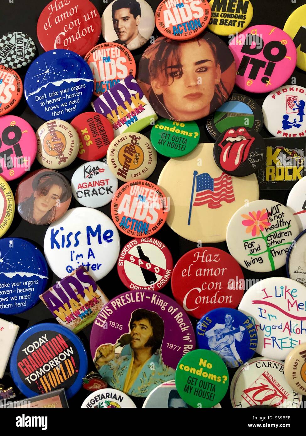 A collection of various political and personality buttons and pins. - Smartphone Captured Stock Image