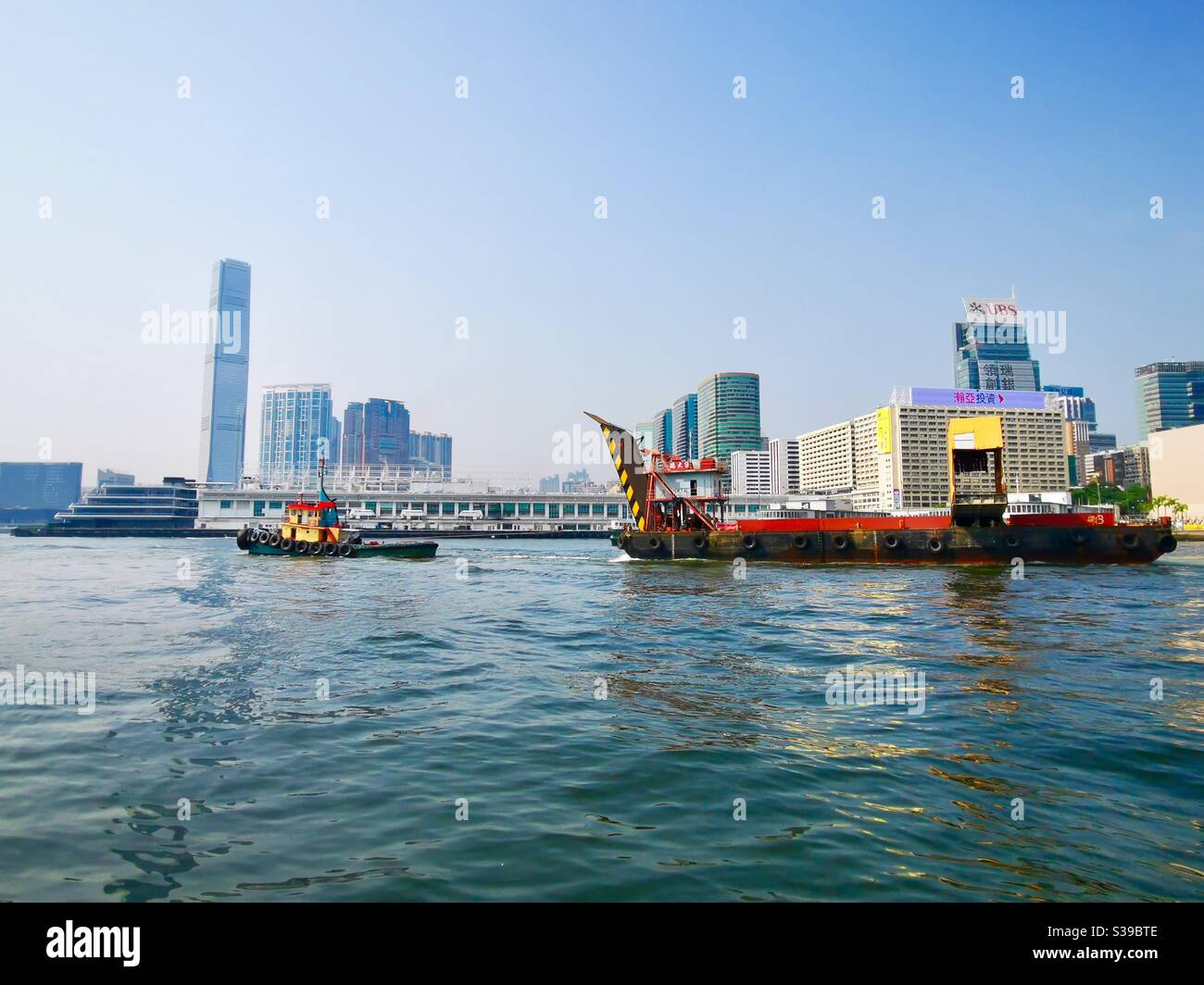 A view of the Kowloon side of Victoria harbour in Hong Kong. - Smartphone Captured Stock Image