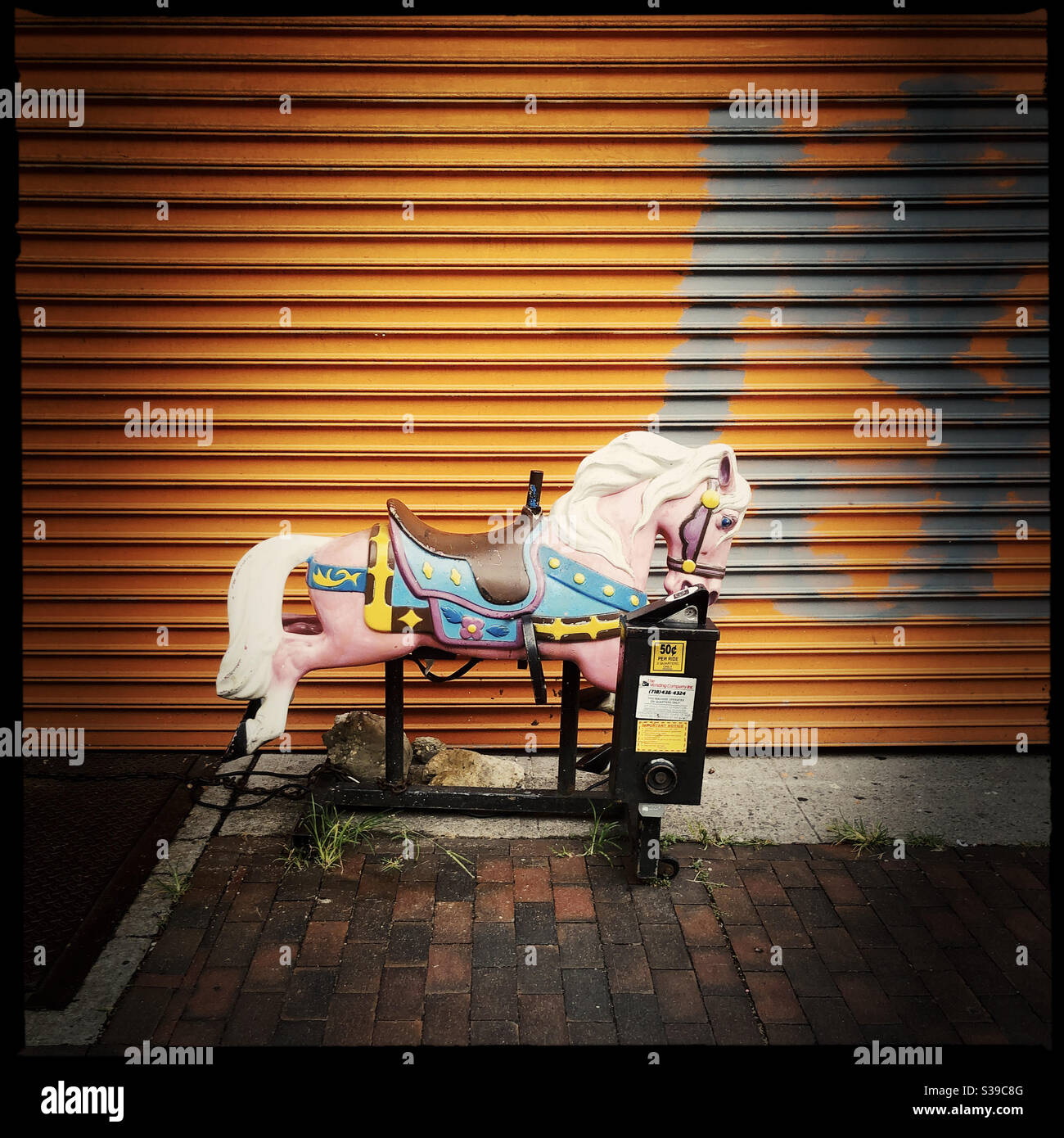 Mechanical Horse ride at Grocery store in South Park Slope, Brooklyn