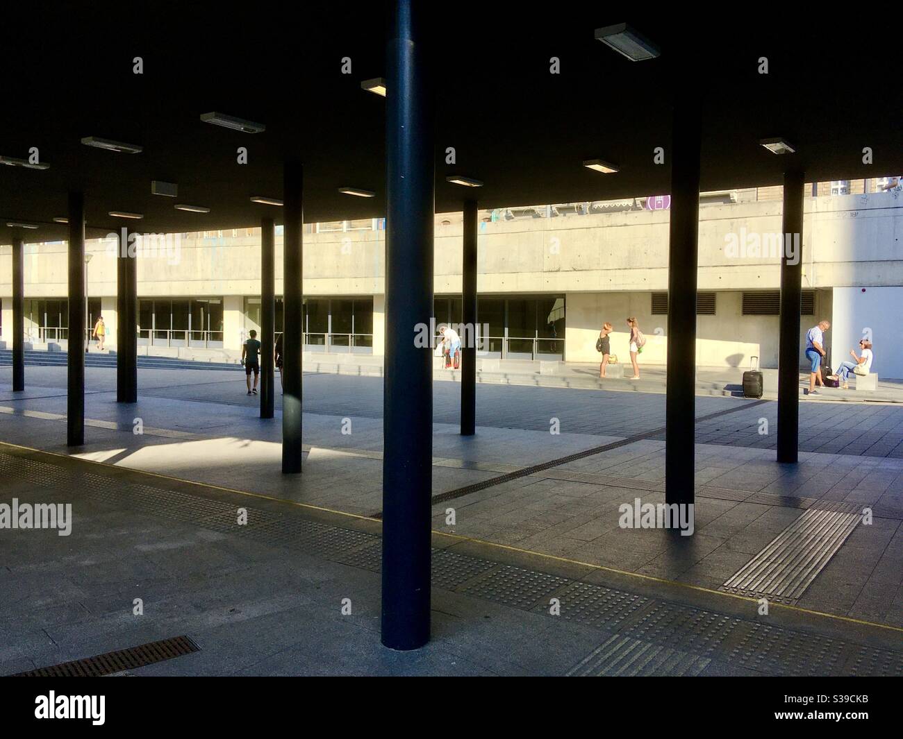 People waiting at the underpass of Keleti palyaudvar (Keleti Railway Station), Budapest, Hungary - Smartphone Captured Stock Image