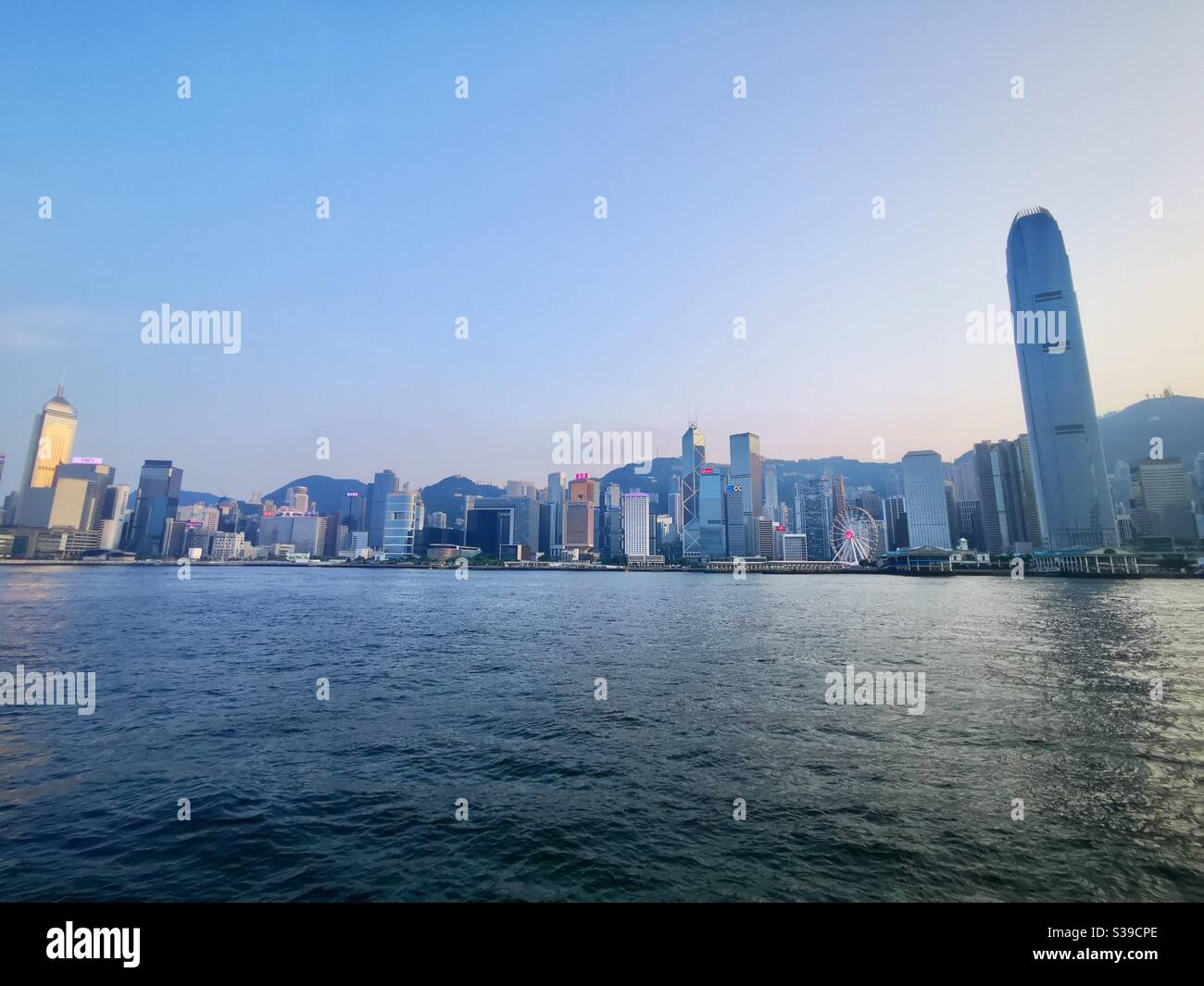 A panoramic view of Hong Kong island as seen from Kowloon. - Smartphone Captured Stock Image