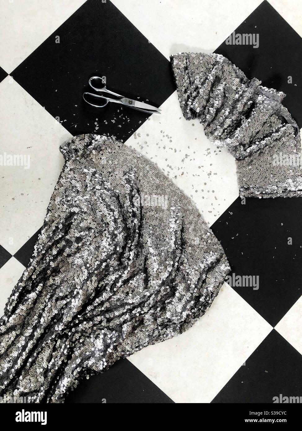 Dress hemming step one, measure and cut to length - Smartphone Captured Stock Image