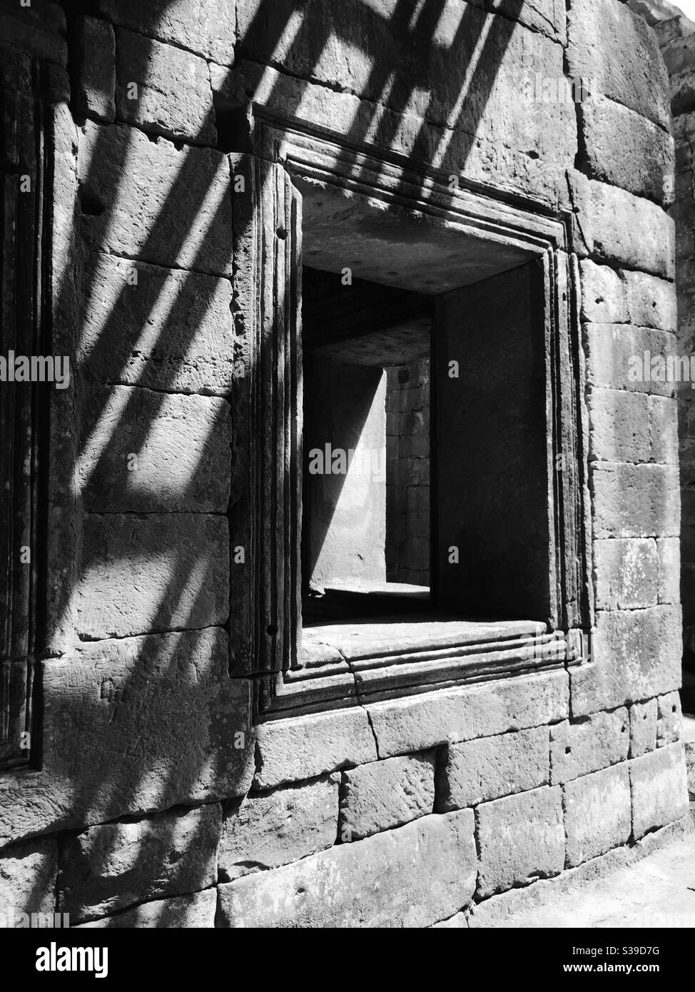 Light and shadow, Window and wall in black and white Stock Photo