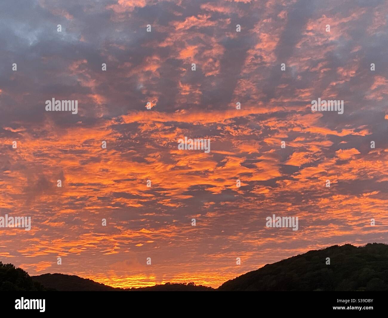 Sunset sky reflections in the estuary Looe Cornwall UK - Smartphone Captured Stock Image