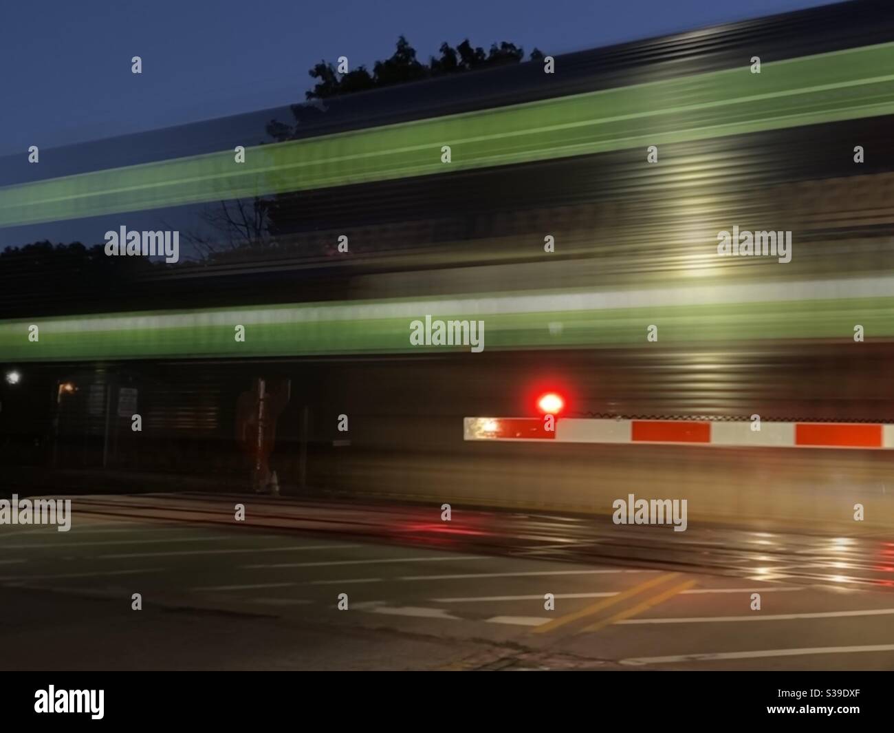 Long exposure shot. Metra commuter rail train departing Kenilworth Station en route to Chicago. - Smartphone Captured Stock Image