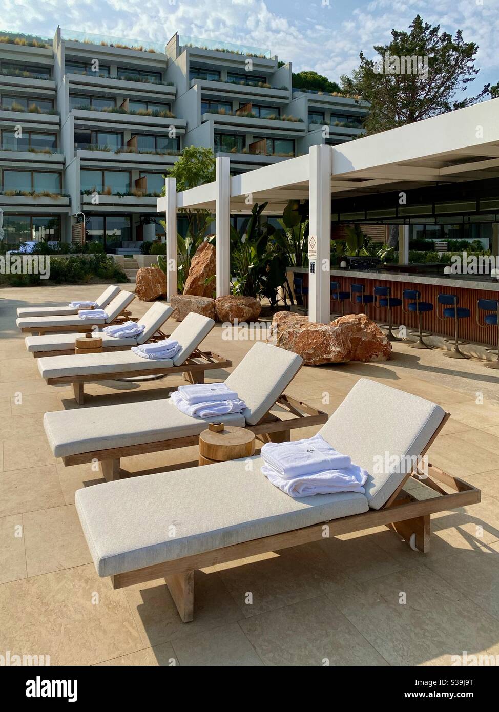 Sun Loungers at Nafsika, Four Seasons Astir Palace Hotel, Athens, Greece  Stock Photo - Alamy