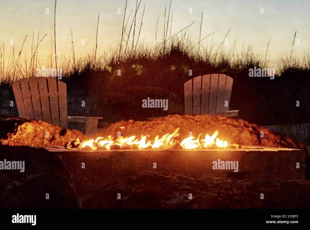 There’s nothing like sitting by a fire pit on the beach at sundown